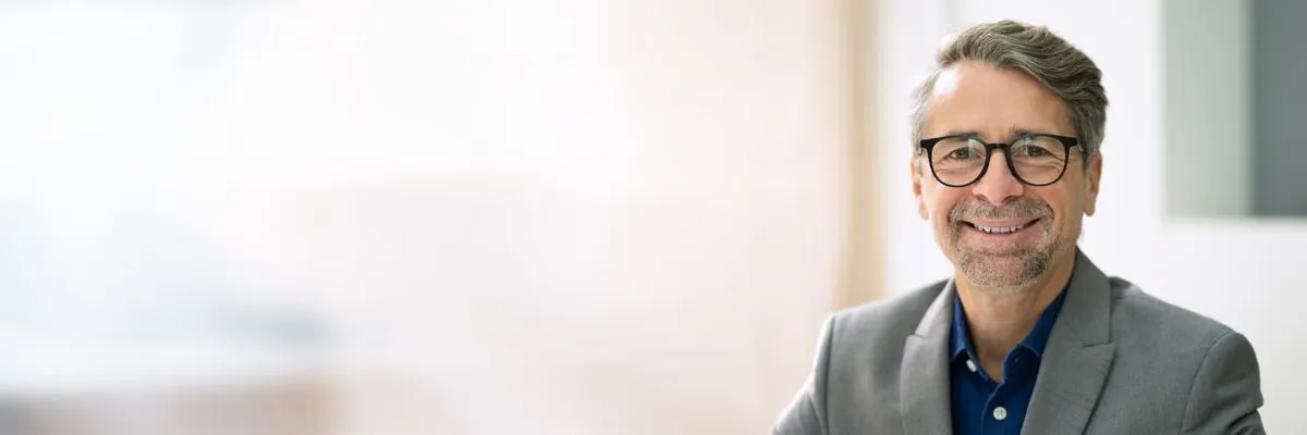 A confident Niagara businessman not worrying about IT problems.